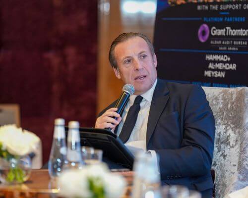 Stage lighting and audiovisual production at DDC Financial Group forum in Riyadh