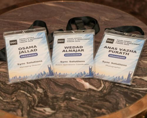 Financial industry professionals networking at DDC investment forum in Riyadh