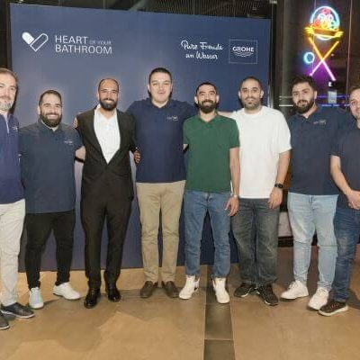 Guests competing in arcade games at an exclusive GROHE networking experience