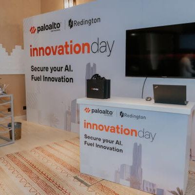 Premium branded environment and stage setup at Palo Alto Networks Innovation Day – corporate event management Saudi Arabia