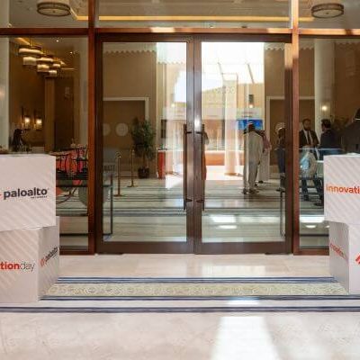 Premium branded environment and stage setup at Palo Alto Networks Innovation Day – corporate event management Saudi Arabia